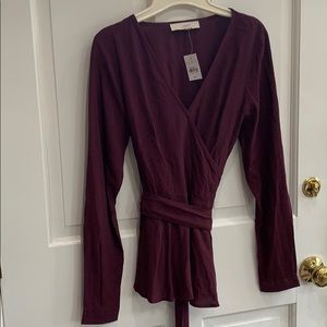 Wraparound blouse, snap closure